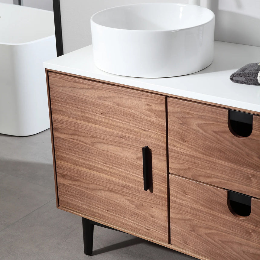 Bathroom vanity with two sinks, mirrors, and decorative elements.