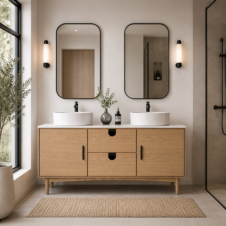 Bathroom vanity with two sinks, mirrors, and decorative elements.