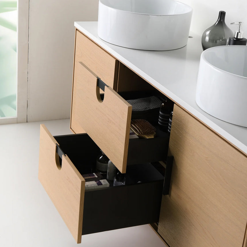 Bathroom vanity with two sinks, mirrors, and decorative elements.