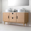 Bathroom vanity with two sinks and a mirror above it.