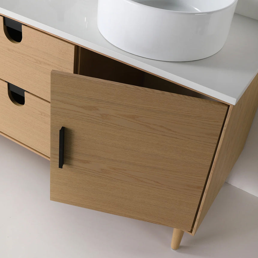 Bathroom vanity with two sinks, mirrors, and decorative elements.