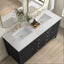 Bathroom vanity with double sink, black cabinet, and marble countertop.