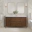 Bathroom vanity with double sink, mirrors, and decorative elements.