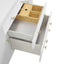 White cabinet with open door revealing a wooden interior