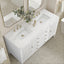 Bathroom vanity with marble countertop, double sink, and decorative elements.