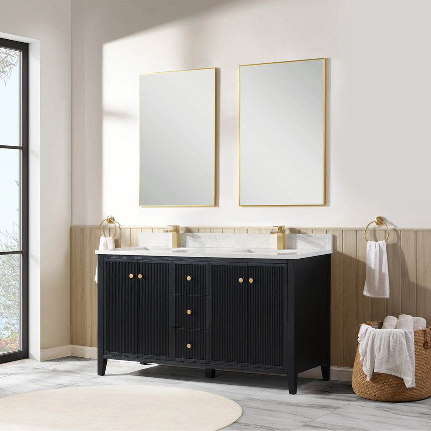 Bathroom vanity with double sink, mirrors, and towels in a well-lit room.