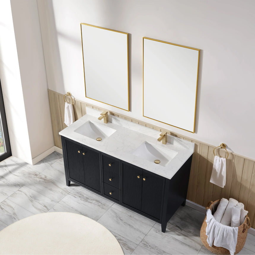 Bathroom vanity with double sink, mirrors, and towels in a well-lit room.