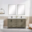Bathroom vanity with double sink and mirrors in a modern bathroom setting.