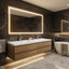 Modern bathroom with a large illuminated mirror, wooden vanity, and bathtub.