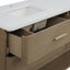 Bathroom vanity with open drawer and white countertop