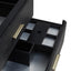Open drawer with compartments and gold handles on a white background