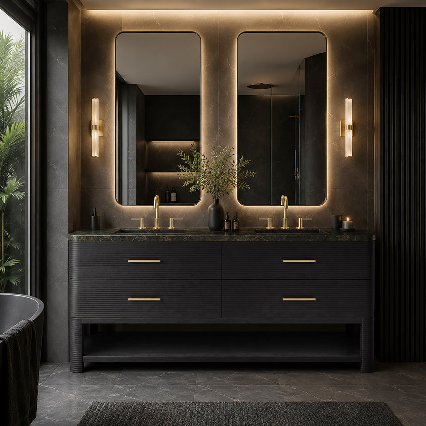 A modern bathroom vanity with a light oak wood frame, six drawers, an open lower shelf, and a white marble top with an integrated sink. The vanity is styled in a bright bathroom with a white freestanding tub, a gold faucet, and a glass shower stall in the background.