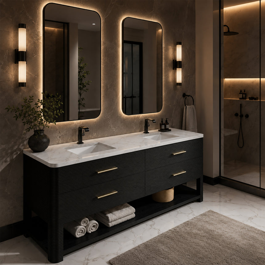 A modern bathroom vanity with a light oak wood frame, six drawers, an open lower shelf, and a white marble top with an integrated sink. The vanity is styled in a bright bathroom with a white freestanding tub, a gold faucet, and a glass shower stall in the background.
