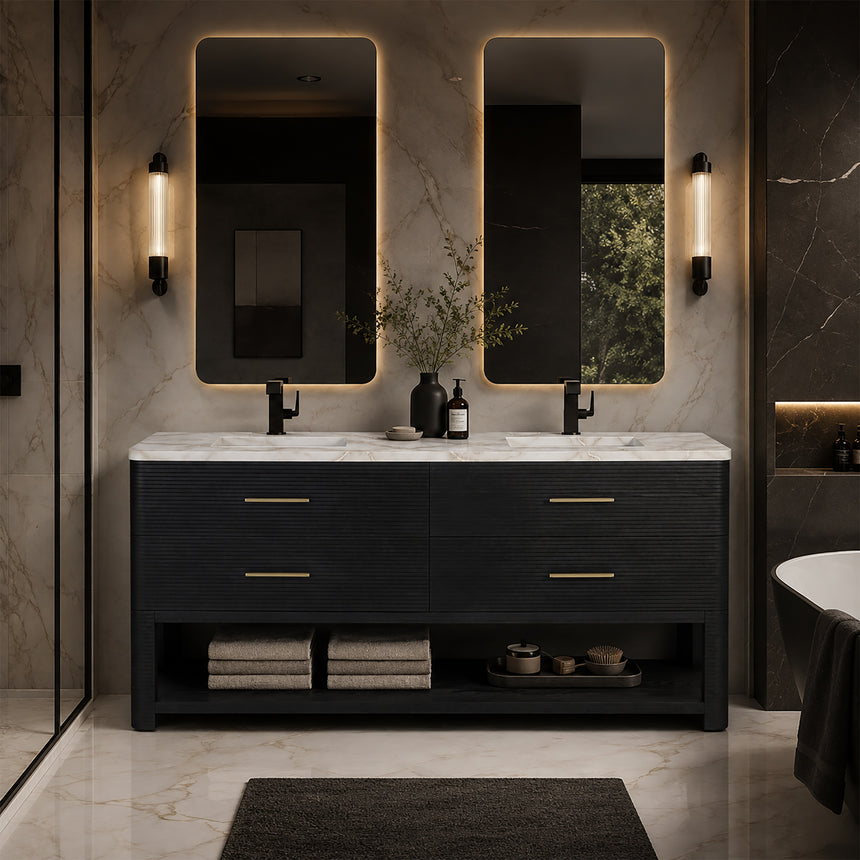 A modern bathroom vanity with a light oak wood frame, six drawers, an open lower shelf, and a white marble top with an integrated sink. The vanity is styled in a bright bathroom with a white freestanding tub, a gold faucet, and a glass shower stall in the background.