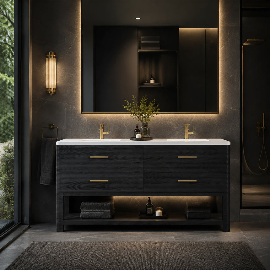 A modern bathroom vanity with a light oak wood frame, six drawers, an open lower shelf, and a white marble top with an integrated sink. The vanity is styled in a bright bathroom with a white freestanding tub, a gold faucet, and a glass shower stall in the background.