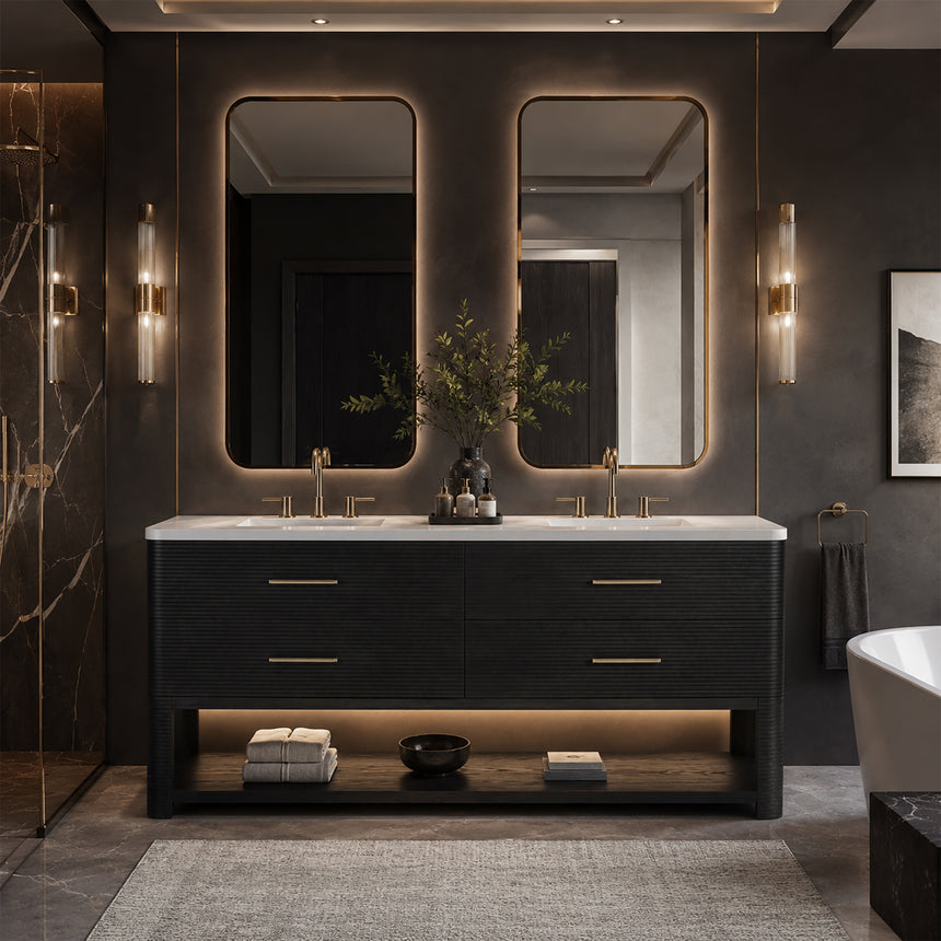 A modern bathroom vanity with a light oak wood frame, six drawers, an open lower shelf, and a white marble top with an integrated sink. The vanity is styled in a bright bathroom with a white freestanding tub, a gold faucet, and a glass shower stall in the background.
