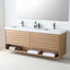 A modern wall-mounted double-sink bathroom vanity with a light natural wood slat front, white countertop, and two matte black faucets, shown against a clean white wall with a large mirror above.