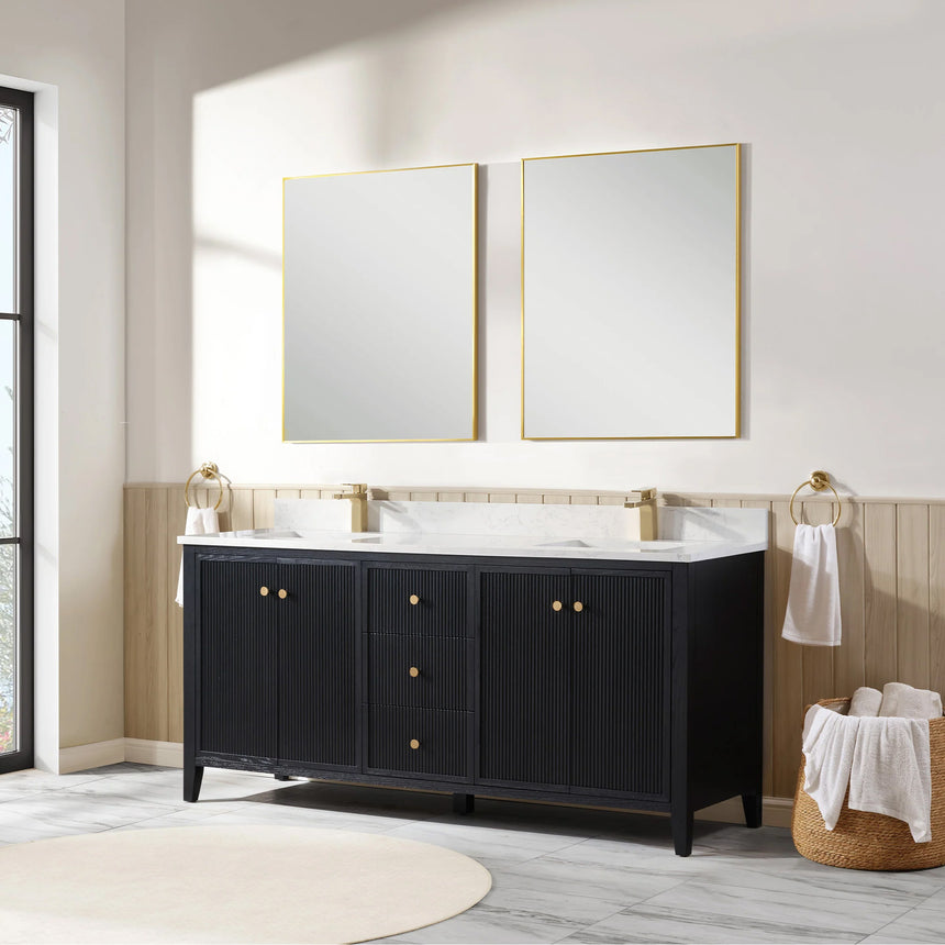 Bathroom vanity with double sink, mirrors, and towels in a well-lit room.