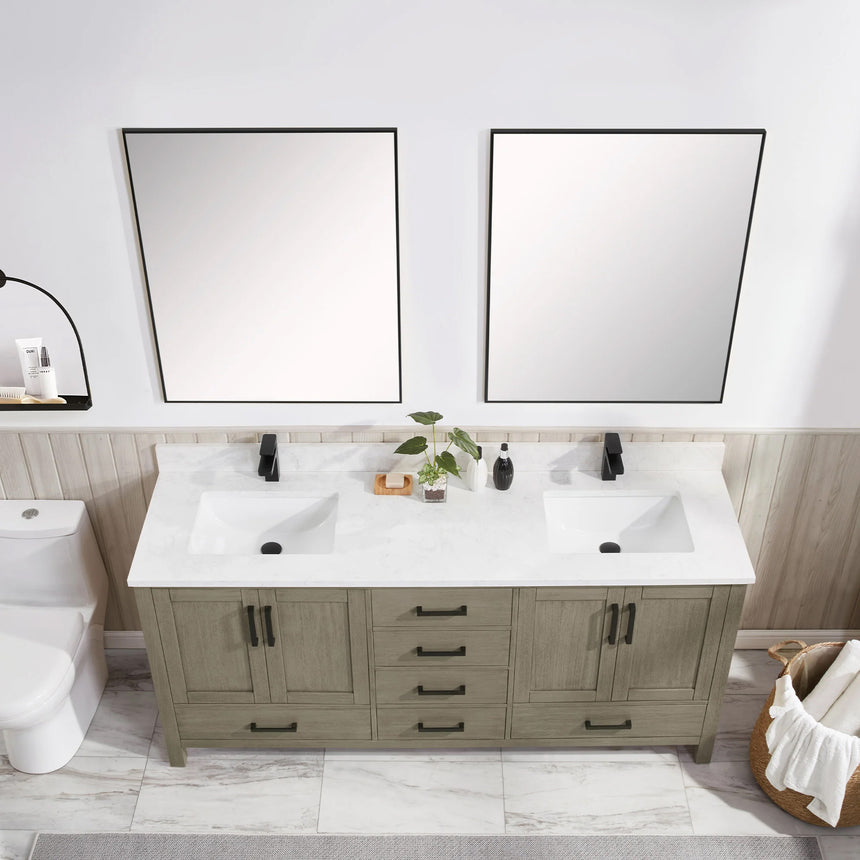 Bathroom vanity with wooden cabinets and white countertop, featuring a toilet and towel on the side.