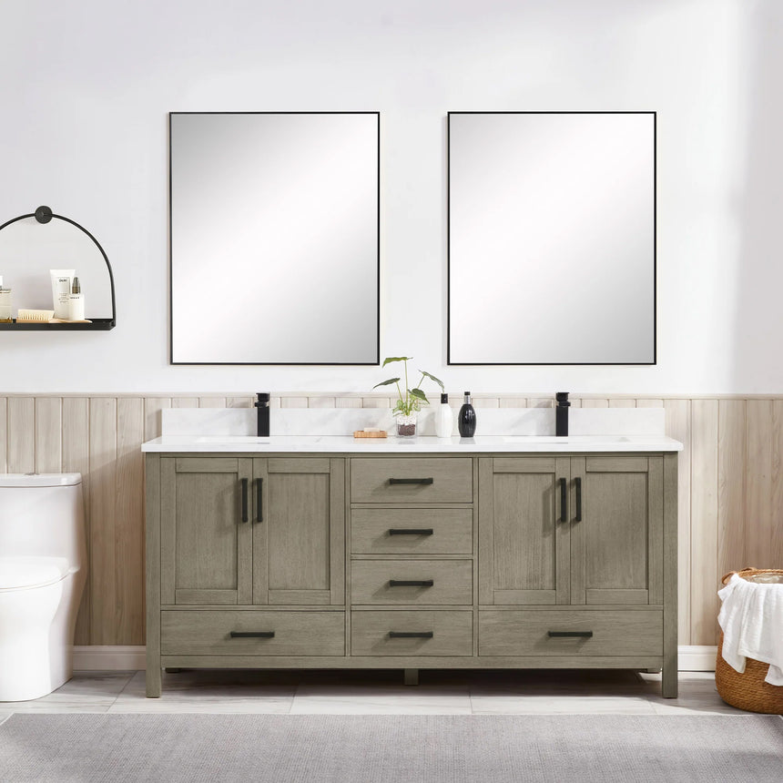 Bathroom vanity with wooden cabinets and white countertop, featuring a toilet and towel on the side.