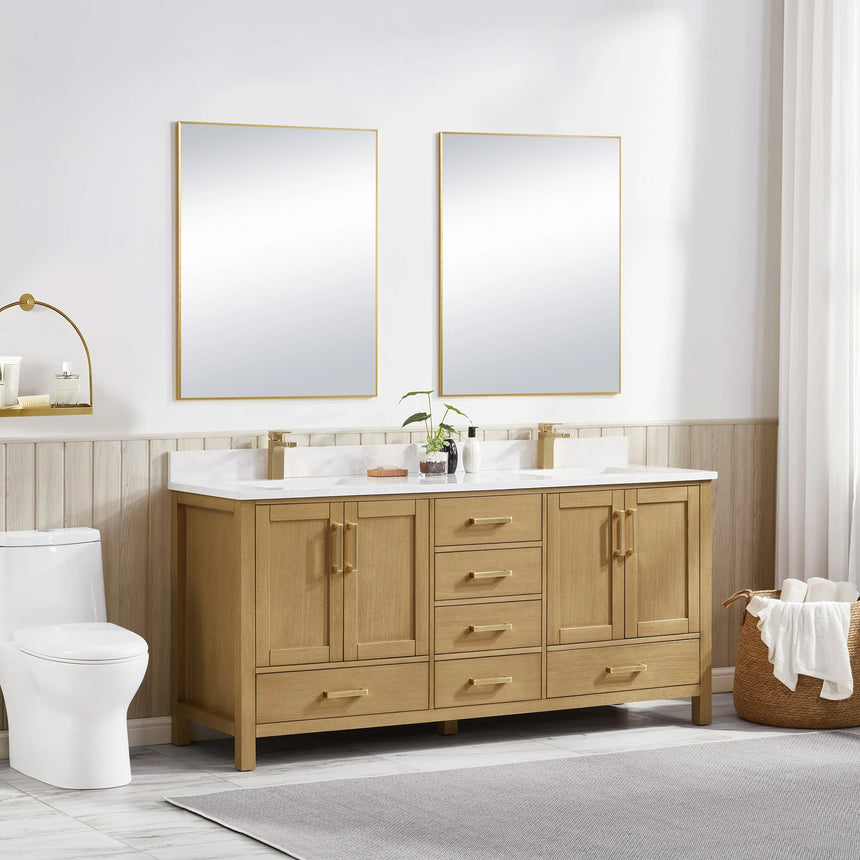 Bathroom vanity with wooden cabinets and white countertop, featuring a toilet and towel on the side.