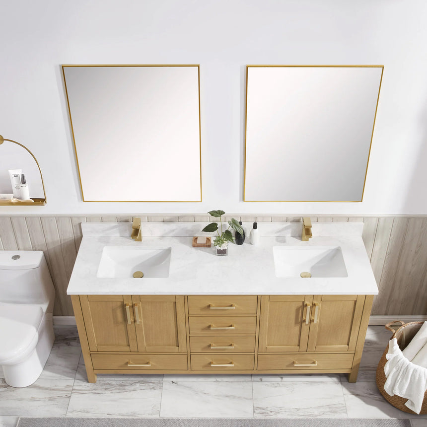 Bathroom vanity with wooden cabinets and white countertop, featuring a toilet and towel on the side.