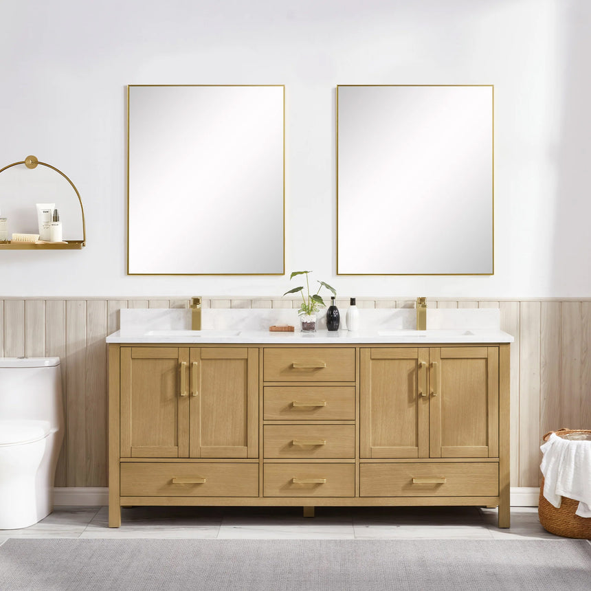 Bathroom vanity with wooden cabinets and white countertop, featuring a toilet and towel on the side.