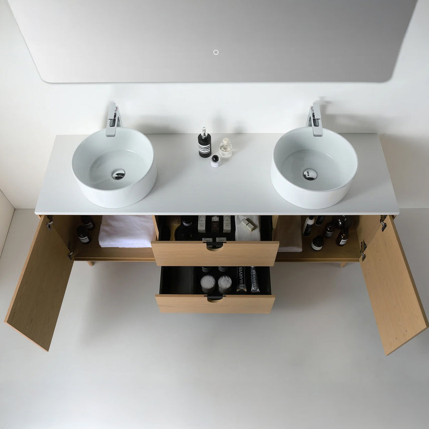 Bathroom vanity with two sinks, mirrors, and decorative elements.