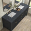 Bathroom vanity with two sinks, mirrors, and decorative items on a wooden floor.