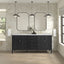 Bathroom vanity with black cabinets, white countertop, and mirrors in a well-lit room.