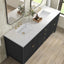 Bathroom vanity with two sinks, gold fixtures, and decorative elements.