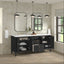 Bathroom vanity with open cabinet doors, mirrors, and decorative items.