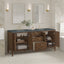 Bathroom vanity with open cabinet doors, featuring a blue countertop and gold fixtures.