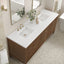 Bathroom vanity with double sink, wooden cabinets, and decorative elements.