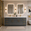 Modern bathroom with double vanity, illuminated mirrors, and decorative elements.