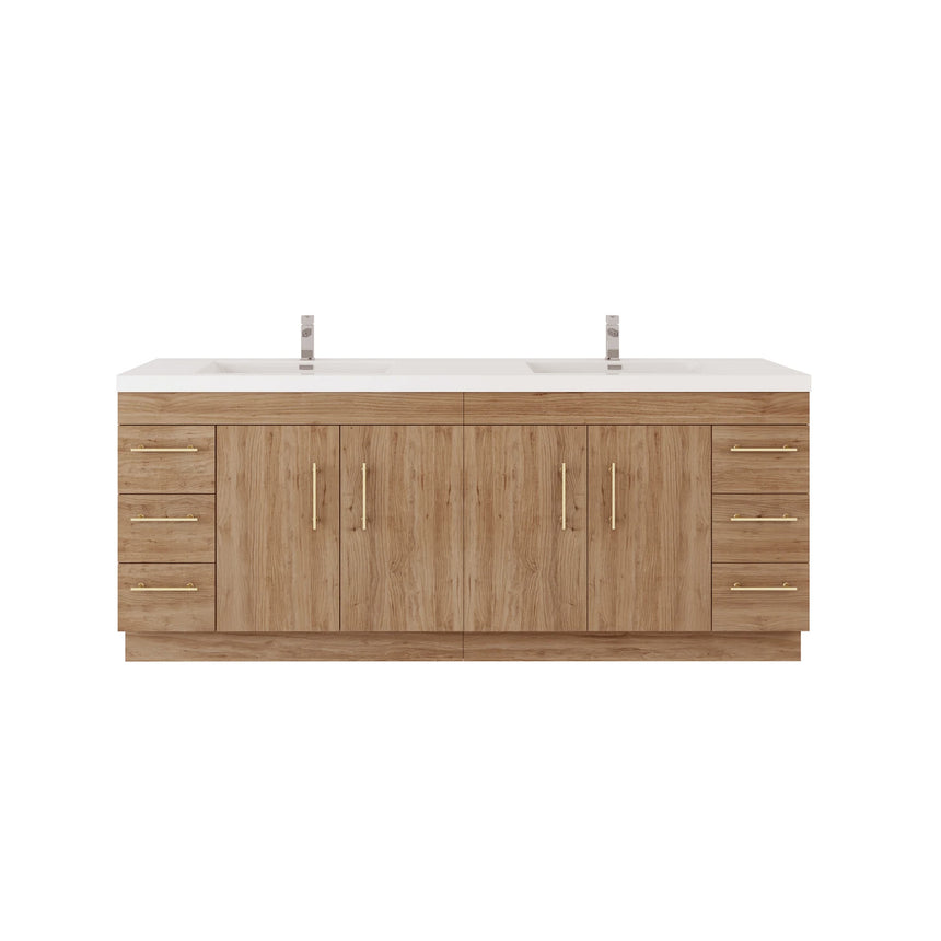 Bathroom with wooden vanity, sink, and decorative elements.