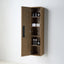A wall-mounted wooden bathroom cabinet with one door open, showing four interior shelves. The cabinet has a medium brown wood grain finish, a black rectangular handle on the door, and silver metal hinges.