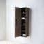 A wall-mounted bathroom storage cabinet in a dark brown finish, shown with its door open to reveal shelves holding toiletries and folded towels against a clean white wall.