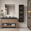 Wooden Linen Cabinet pair with freestanding vanity in modern bathroom