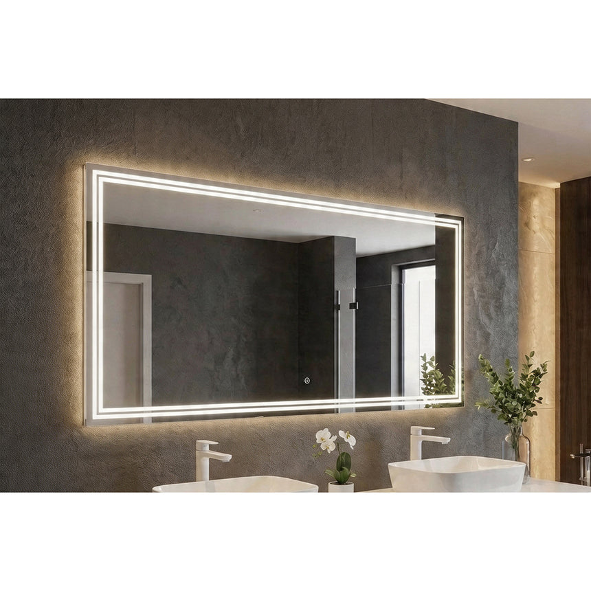 Bathroom mirror with LED lighting on a concrete wall.
