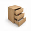 A three-drawer storage cabinet in a light oak wood finish, shown from a front-facing perspective against a solid white background.