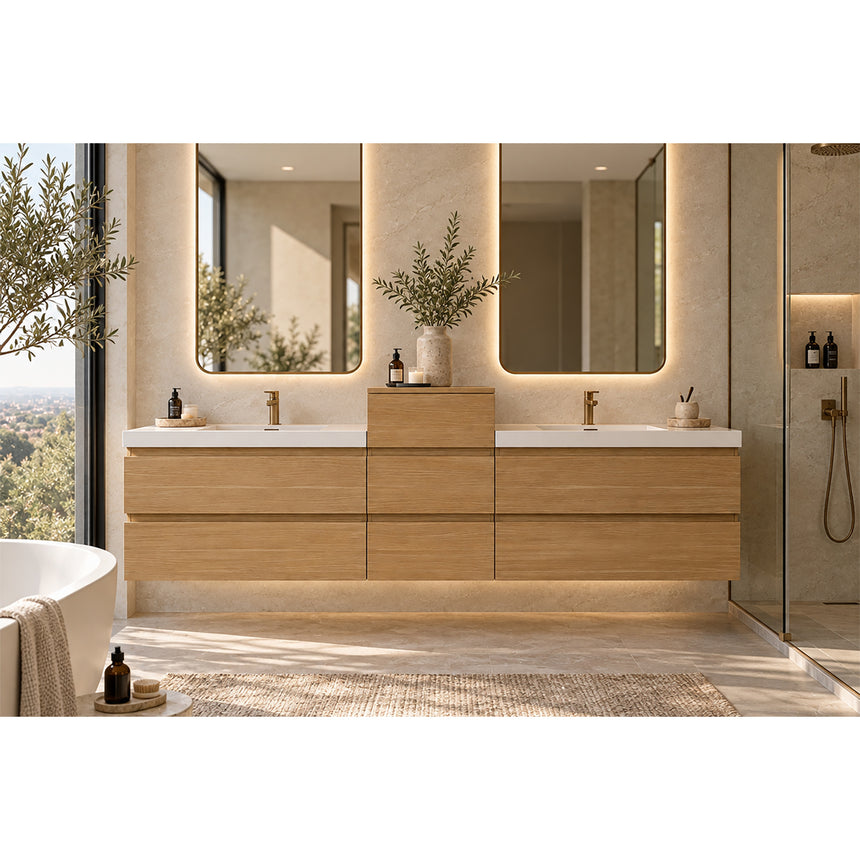 A modern floating double-sink bathroom vanity in light wood with white countertops and integrated mirrors, shown in a bright contemporary bathroom setting.