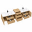A double-sink bathroom vanity cabinet in light natural wood with white ceramic tops, black faucets, and multiple open drawers and cabinet doors, shown on a plain white background.