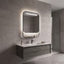 Bathroom with a vanity unit, sink, and illuminated mirror.