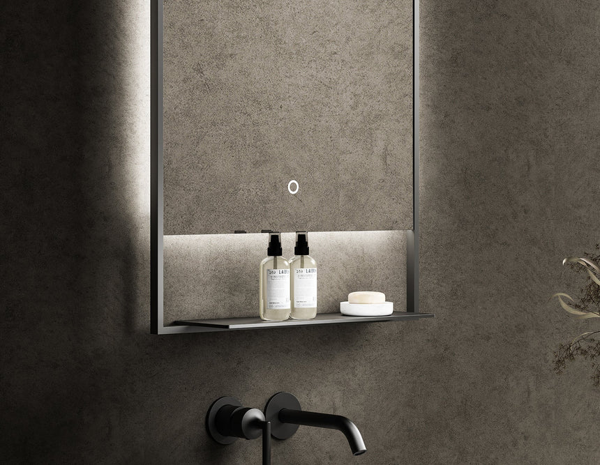Rectangular mirror with LED lighting on a dark wall
