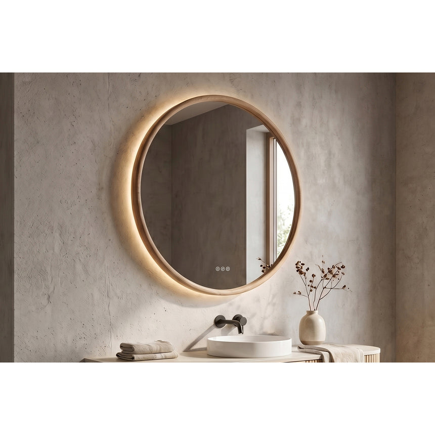Bathroom mirror with LED lighting on a concrete wall.